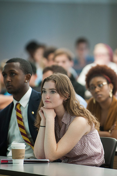 Students looking curious and attentive during a lecture.
