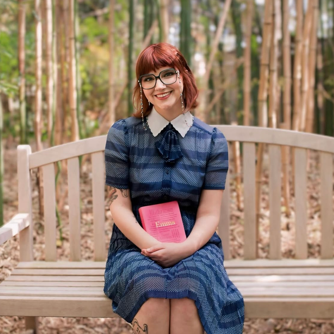 Emma sitting on a bench